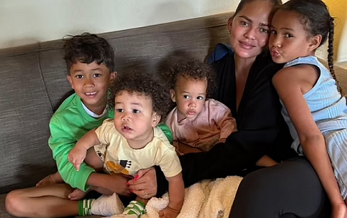CHRISSY TEIGEN 'VERY SCARED' AS SHE EVACUATED HOME WITH FOUR KIDS, PETS, AND HUSBAND